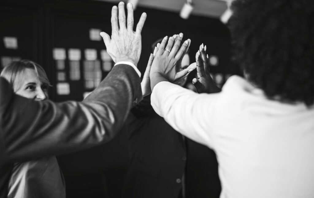 business team giving a high five