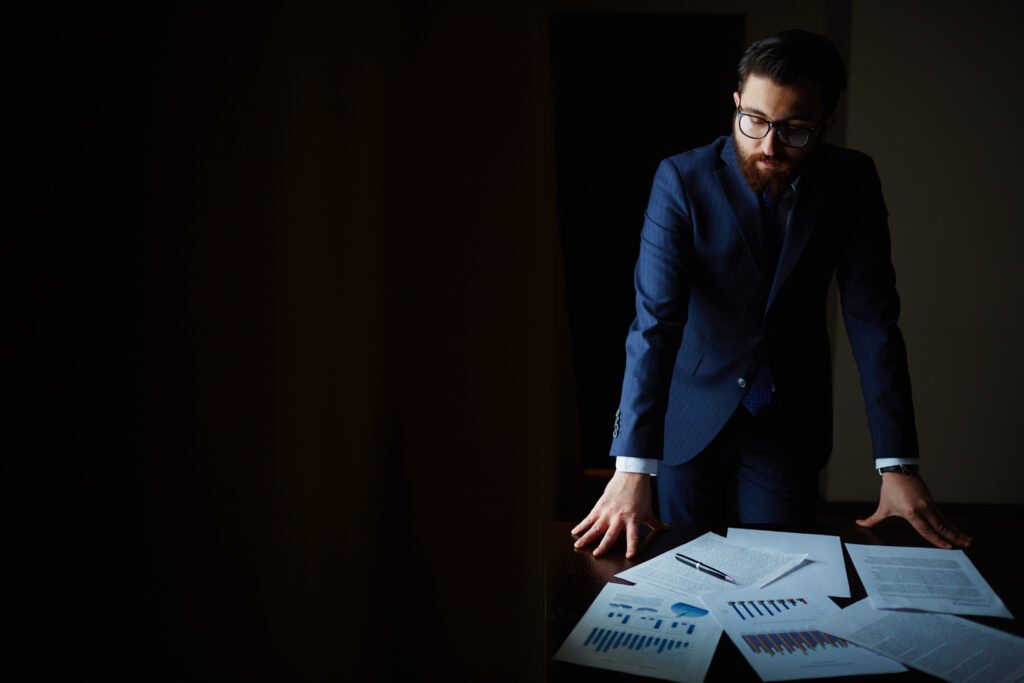businessman in office hands on table